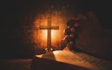 vintage-photo-hand-with-bible-praying-scaled.jpg